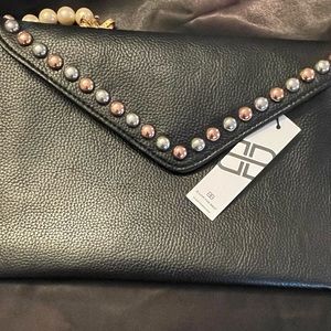 Below the belt womans  black Leather Clutch style purse 10x6" Brand New.